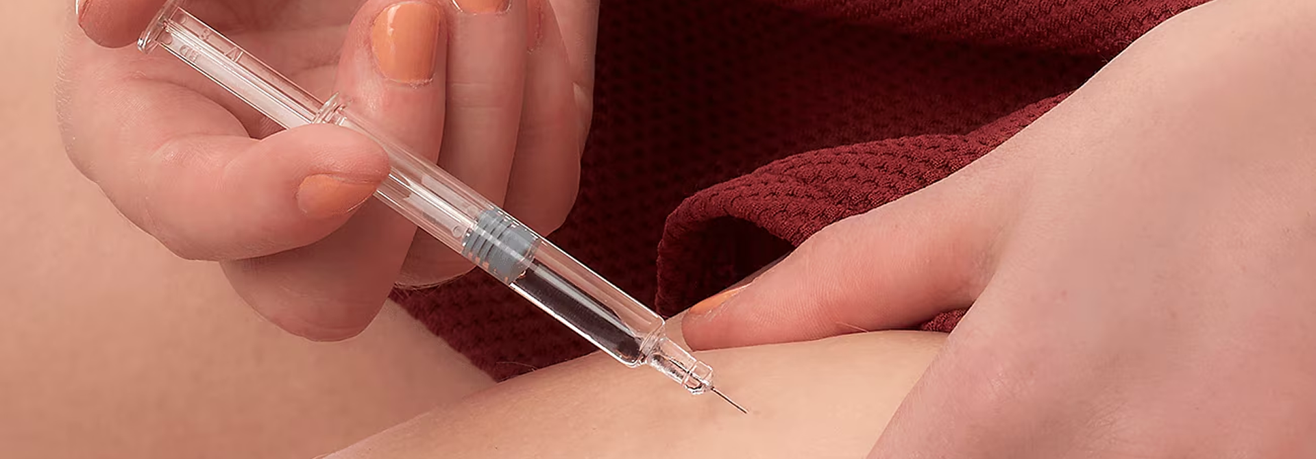 Patient receiving glutathione detox injection at M-Aesthetics clinic in Pune